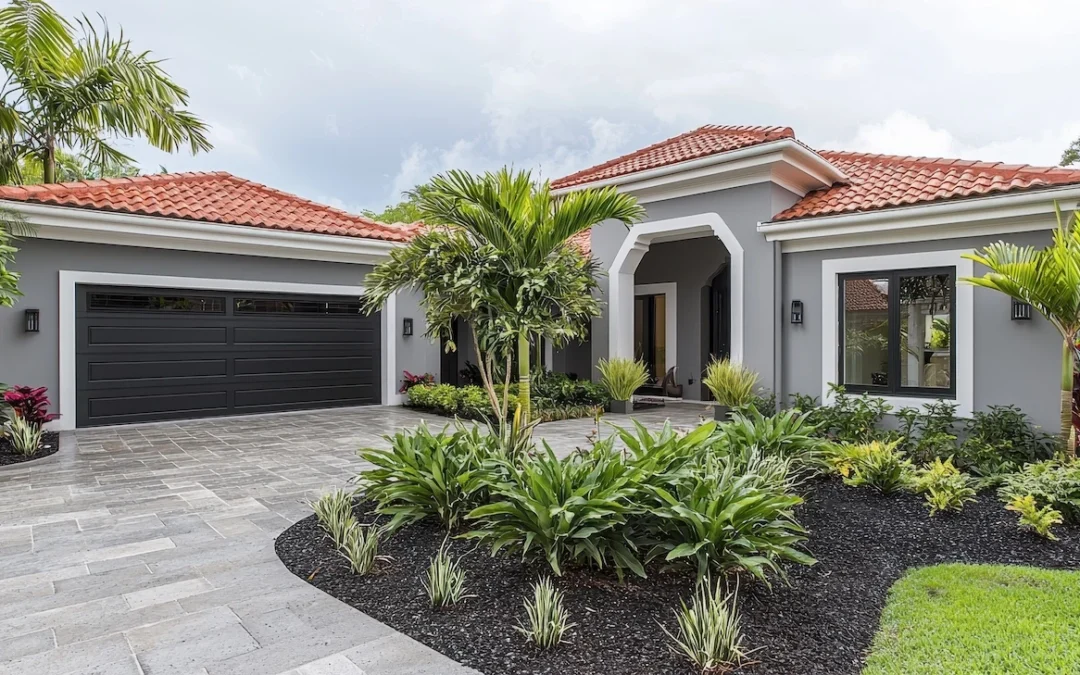 Modern home with tropical landscaping.